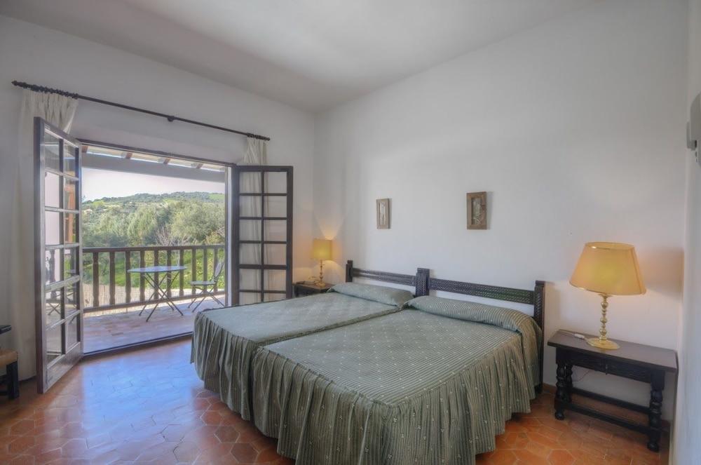 Tugasa Hotel Las Truchas El Bosque Bagian luar foto
