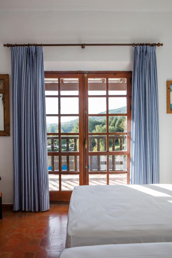 Tugasa Hotel Las Truchas El Bosque Bagian luar foto