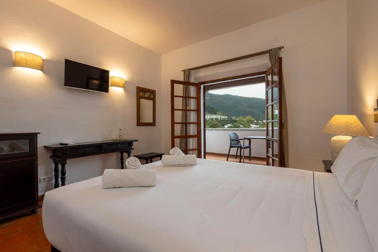 Tugasa Hotel Las Truchas El Bosque Bagian luar foto