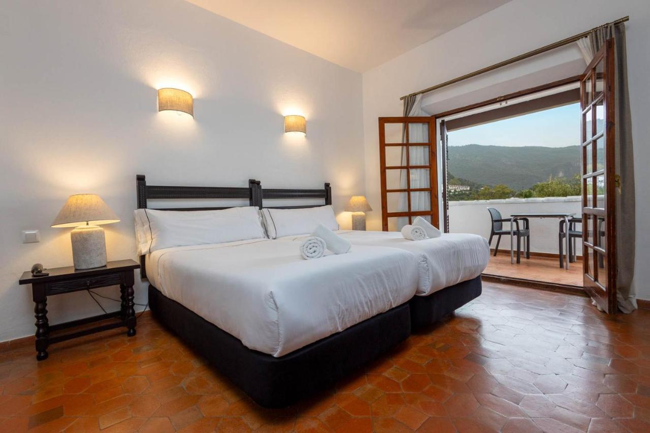 Tugasa Hotel Las Truchas El Bosque Bagian luar foto